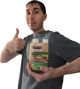 Author holding a bottle of Synflex 1500 Formula giving the thumbs up
